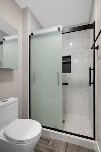 Beautiful tiled shower inthe owner's suite.