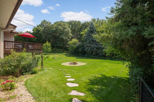 The yard is also fully fenced with tons of trees for privacy.