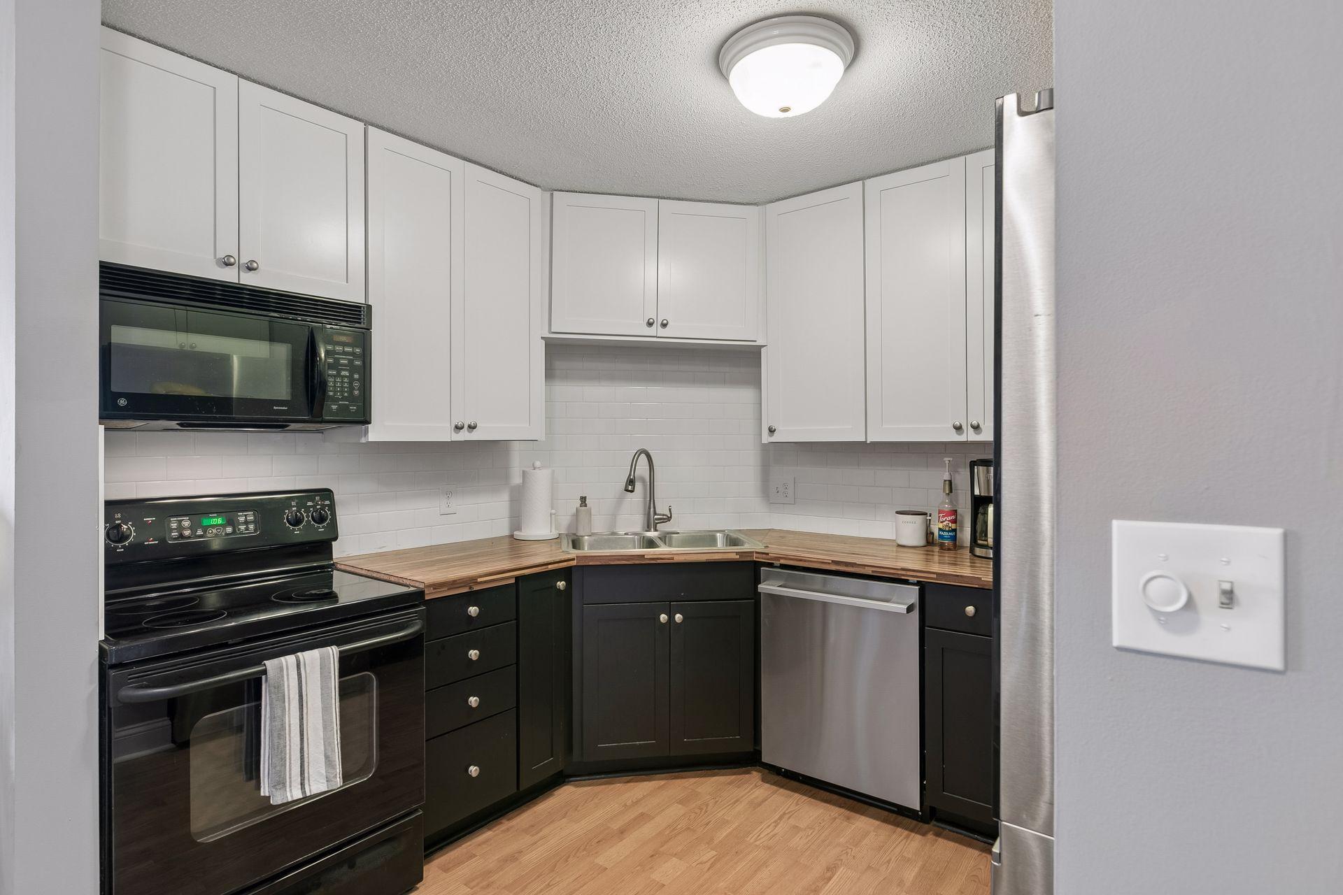 Refinished kitchen cabinets August 2024