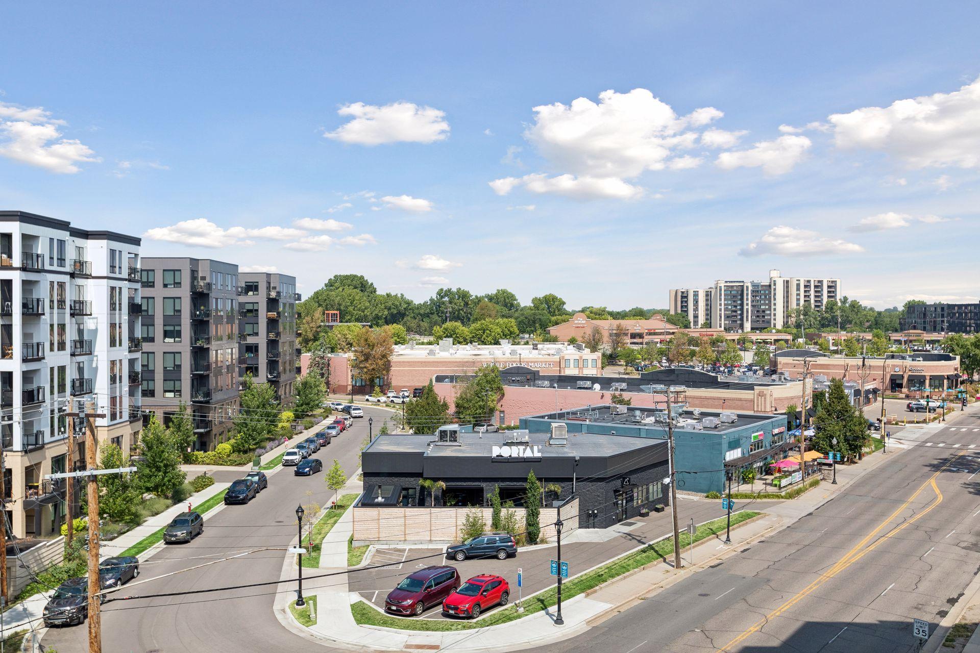 View from balcony - New Green Line light rail station is at the end of the street to the left of Portal. Service begins in 2027.