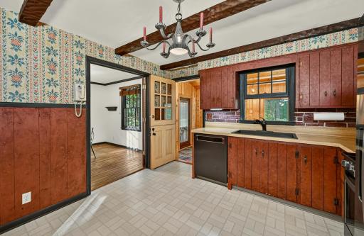 Kitchen with access to the Sun room and back yard