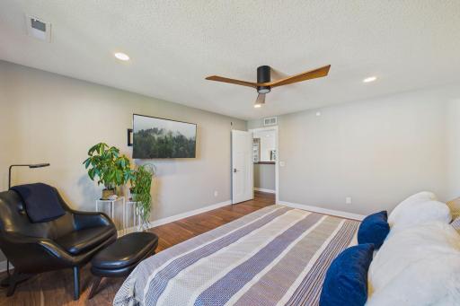Another view of the primary bedroom.