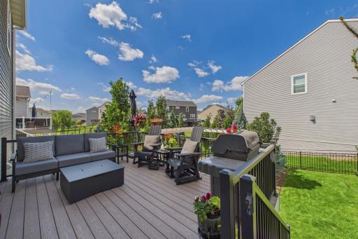 Step outside on you own maintenance free deck, the perfect place to grill out and spend time with friends!
