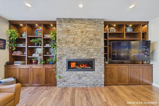 This custom entertainment center creates a true showpiece that anchors the space!