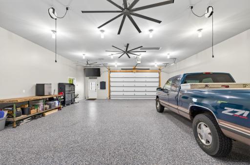 Impressive 1400 square foot detached garage/workshop with in floor heat and 11.5 foot ceilings.