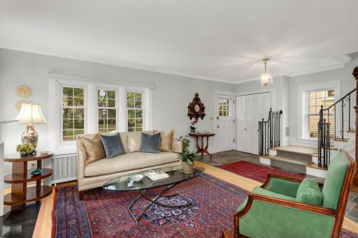 The charming living room with hardwood floors
