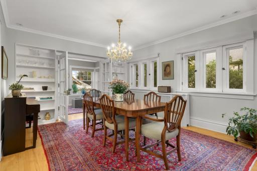 Rebuilt double bookcases framing the French doors to the sunroom