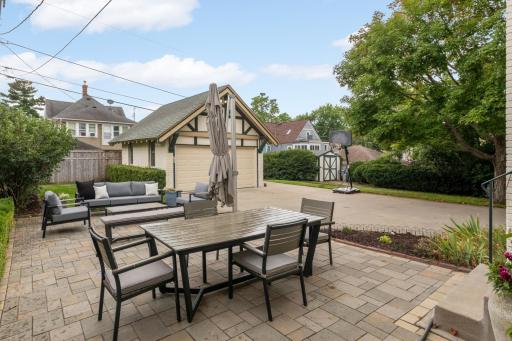 The patio has both a sitting and dining space