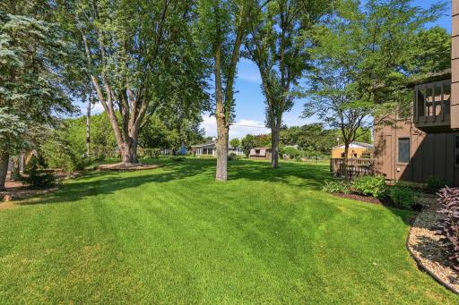 Towering trees shade the lot during the summer months.