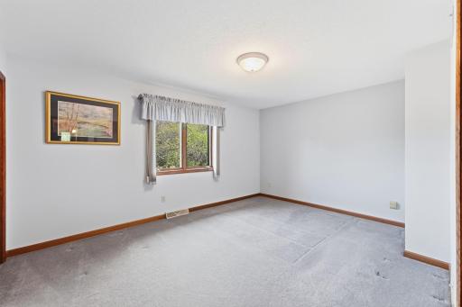 Third upper level bedroom provides a blank canvas for you to customize.