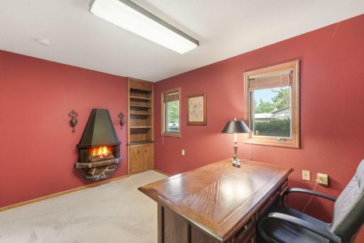 The fireplace adds character and a welcoming feel to the room.