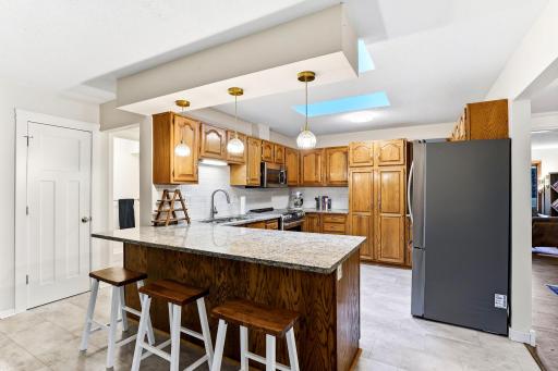 Kitchen with Stainless appliances, granite counters