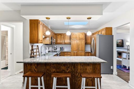 Eat-in kitchen with barstool seating