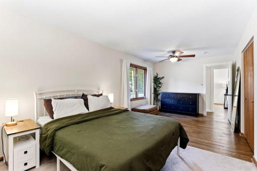Large main BR with ceiling fan, sitting area