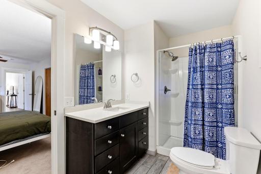 Vanity with granite, updated lighting