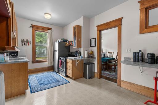 Kitchen spans entire width of the apartment