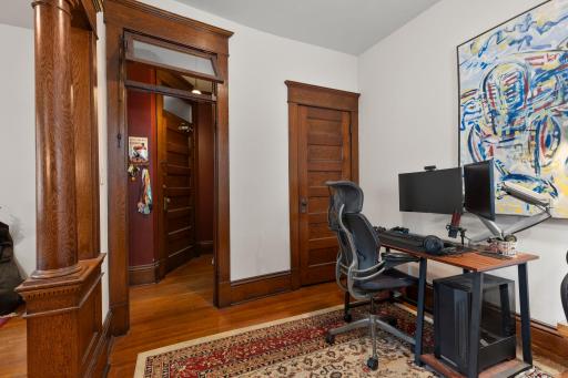 Den has a closet and hardwood floors