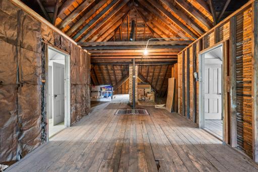 The upper level has two rooms on either side of the main room