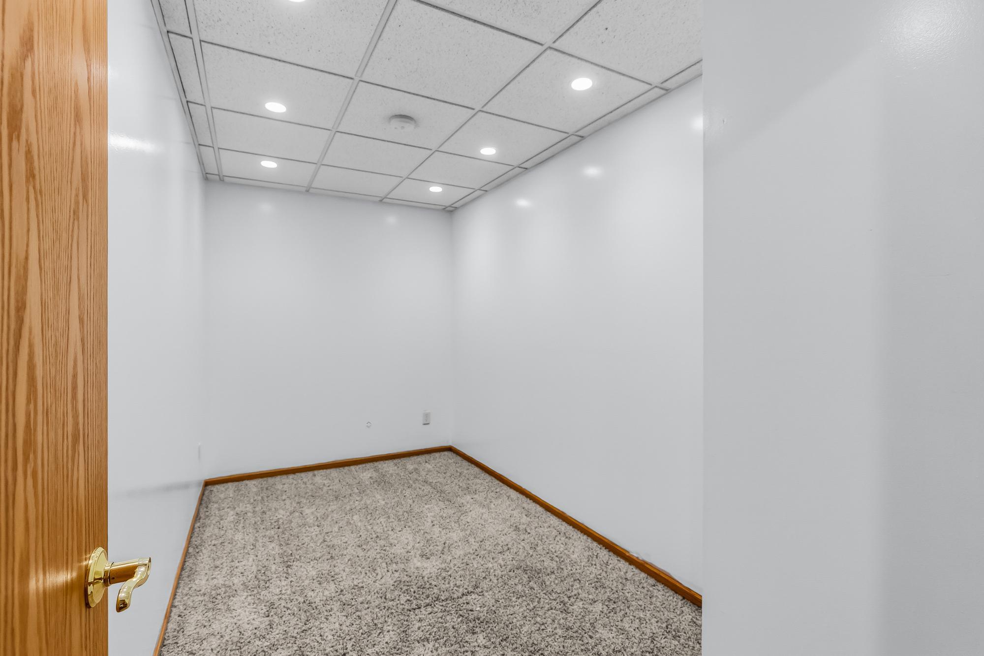 This flexible lower-level space makes a perfect dedicated home office or hobby room.