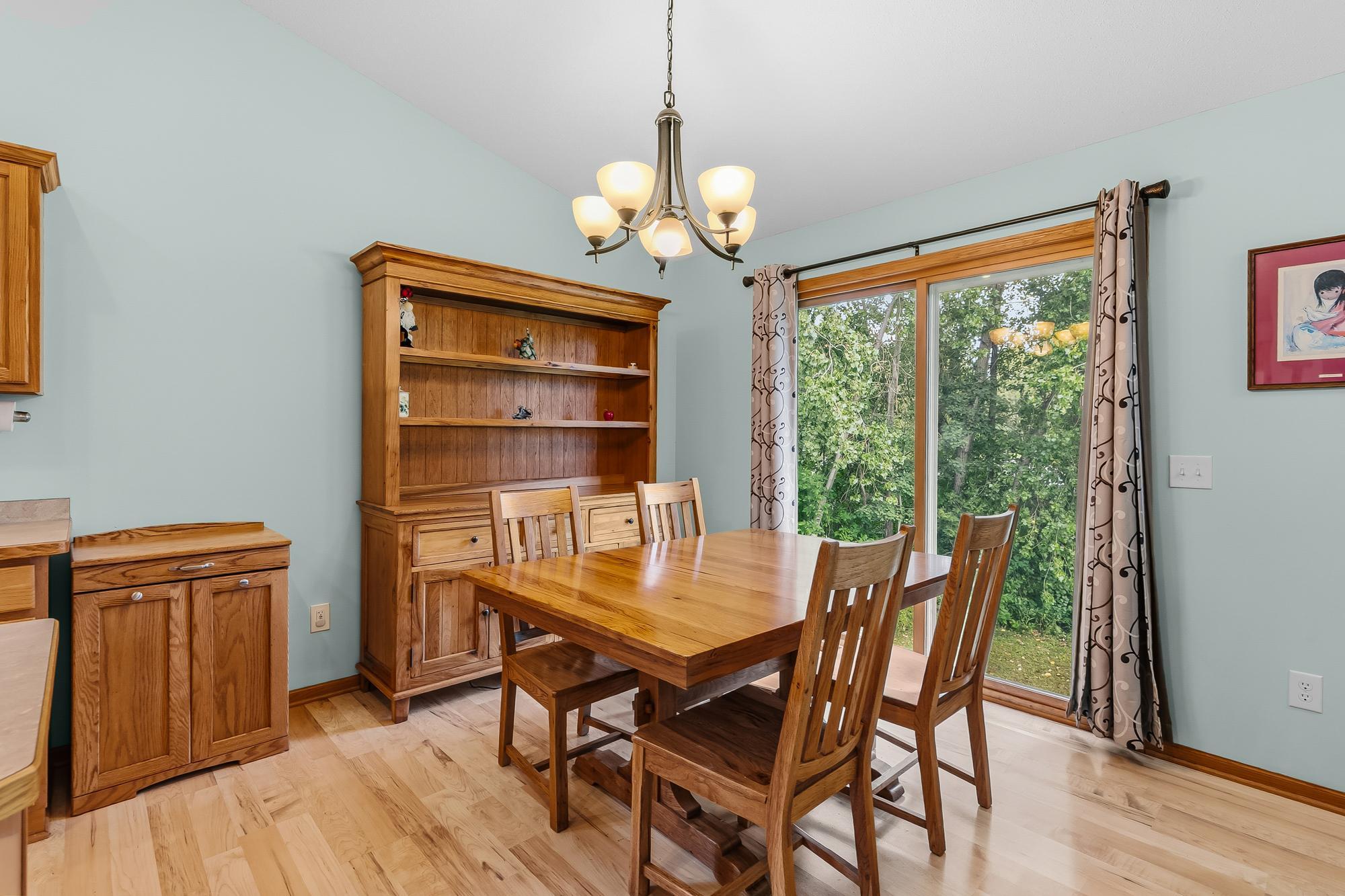 The eat-in kitchen layout seamlessly connects the cooking and dining spaces.