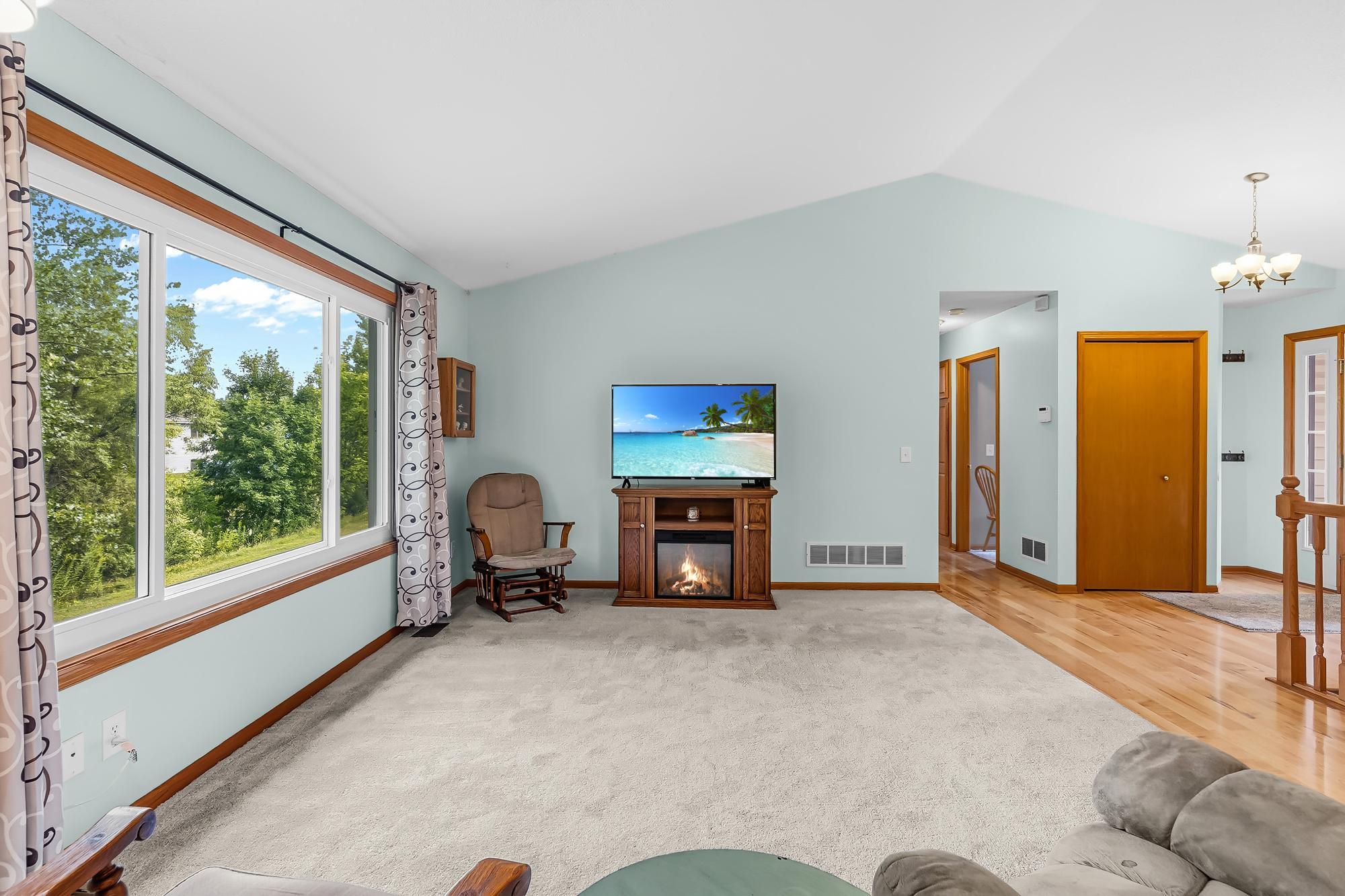 The main-level living room offers a bright, inviting space to relax.