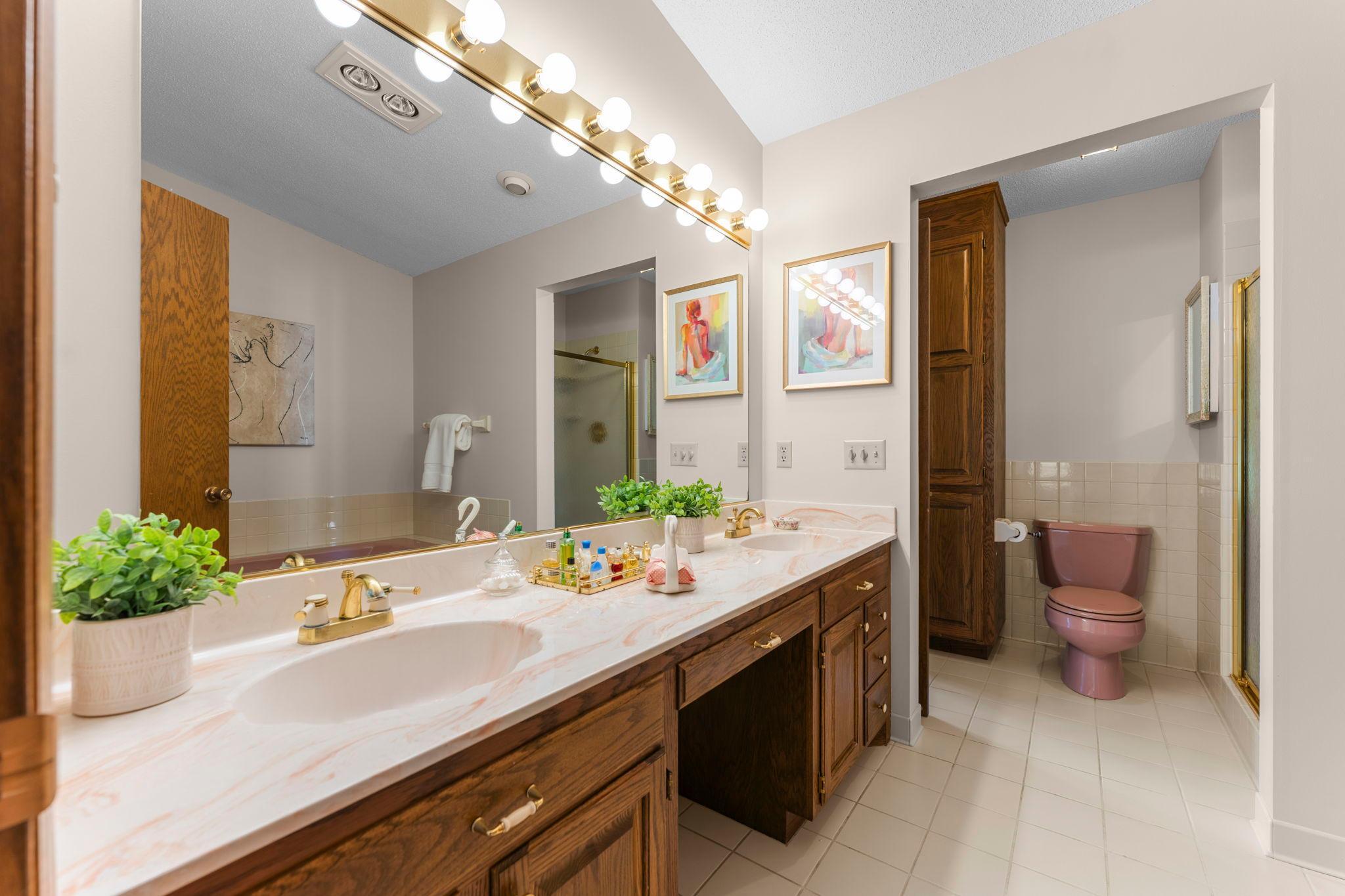 Primary bedroom with double vanity