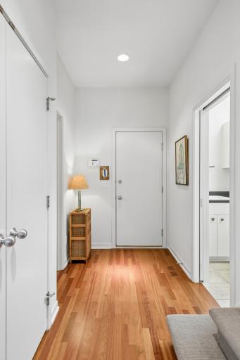 Back hall to guest powder room, laundry room and access to garage