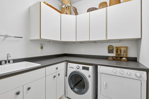 Convenient main-level laundry with ample storage