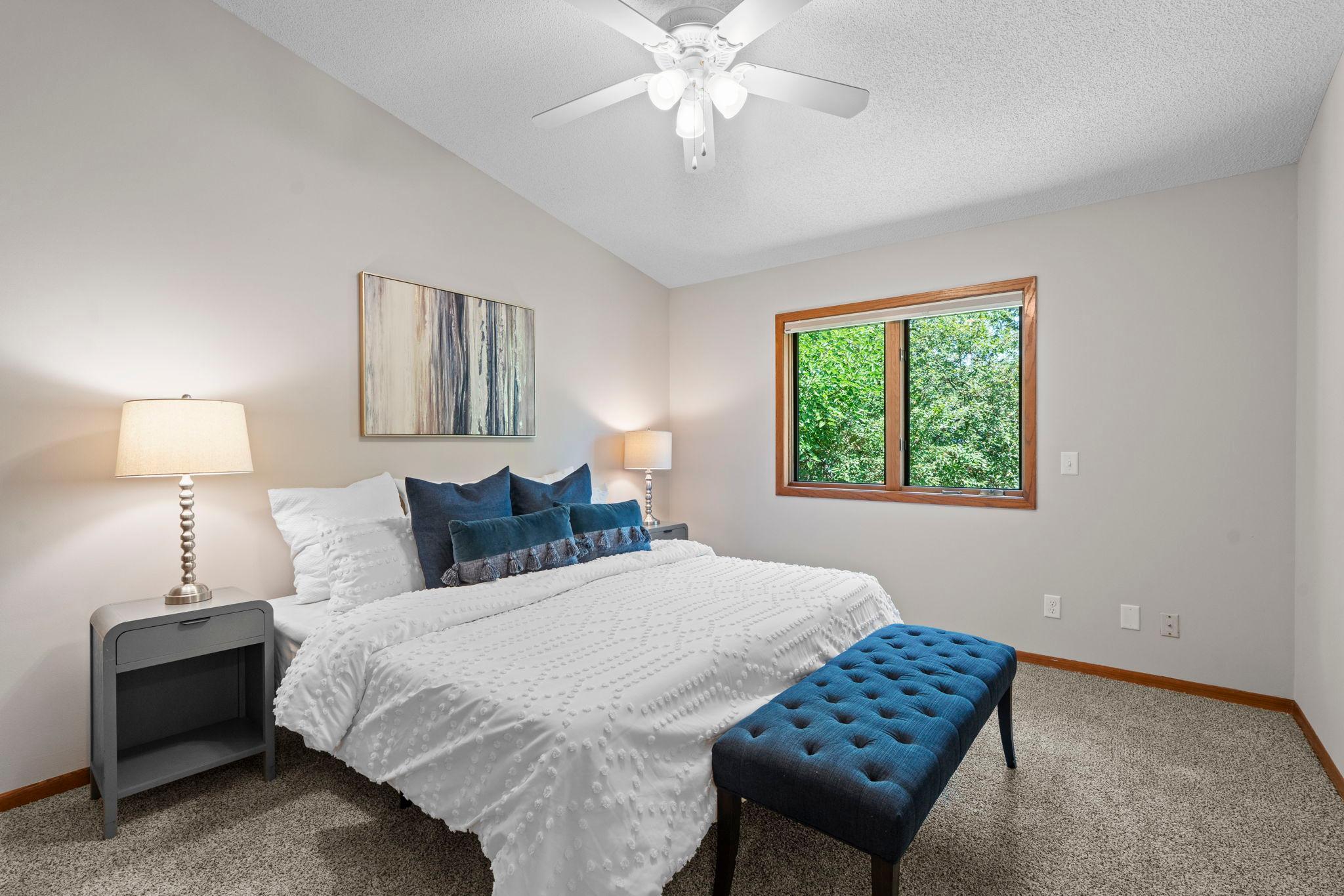 Primary bedroom overlooking the backyard