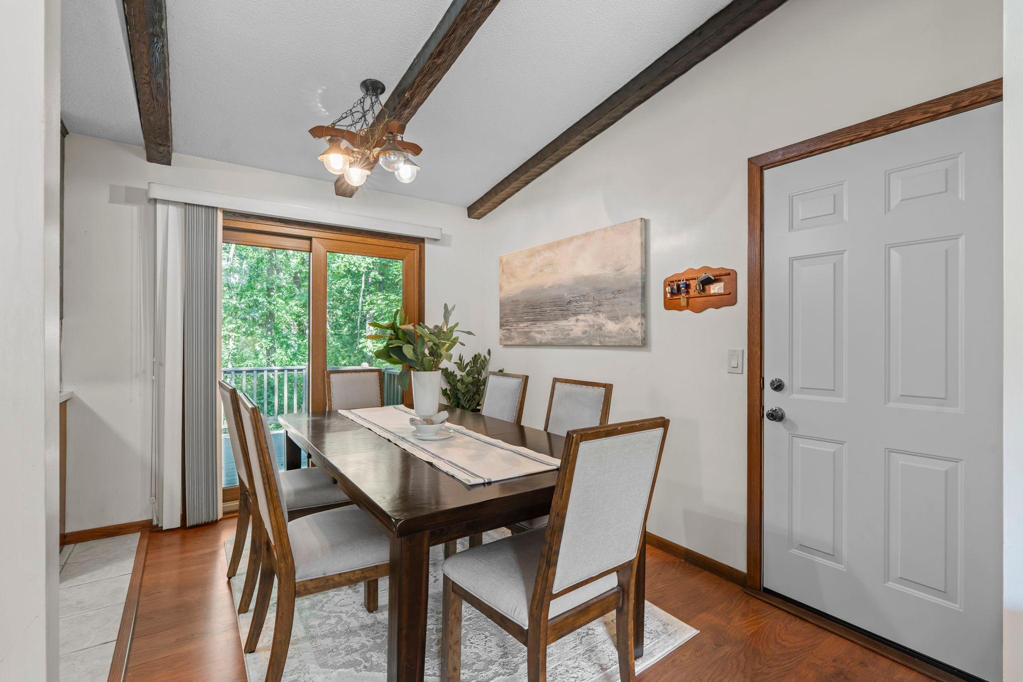 Dining room with access to the deck and attatched 2-car garage.