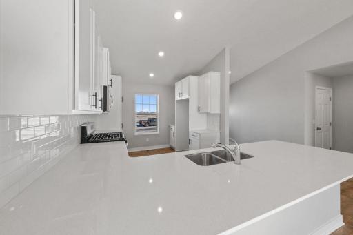 A kitchen window to brighten up the space! Photo is of similar home. Colors and options may vary. Ask Sales Agent for details.
