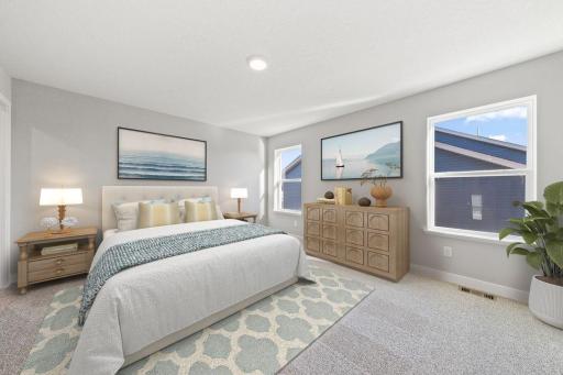 Owner's suite is large enough for a King bed and more. Photo is of a similar staged home. Colors and options may vary. Ask Sales Agent for details.