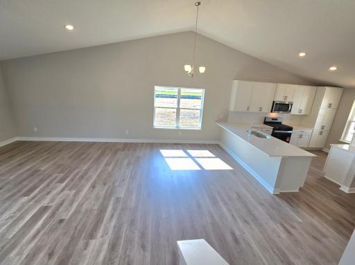 The Rushmore Main Floor at Highlands at Eagle View in Elko New Market. Photo is of actual home. Options and colors may vary. Ask Sales Agent for details.
