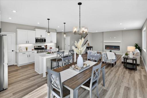PHOTO OF A DIFFERENT HOME WITH SIMILAR PLAN AND FINISHES.