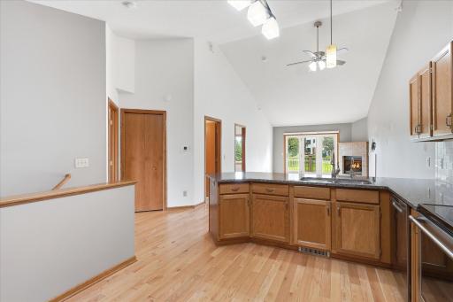 View from vaulted Kitchen into Living Room