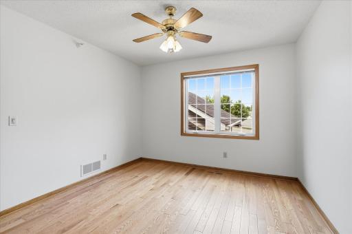 2nd Bedroom with hardwood floors, ceiling fan/ceiling and nice size closet with organizer