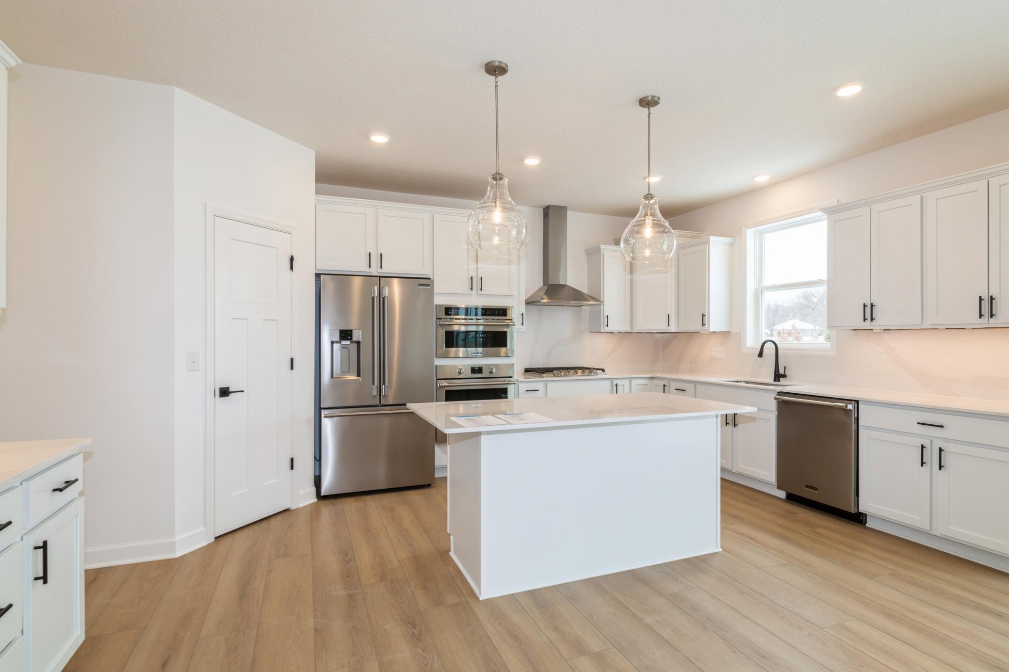 (All the following photos are of a similar home, actual finishes may vary.)