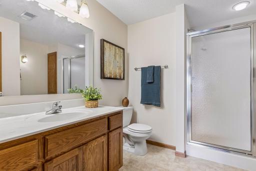 A finished lower-level bathroom is already in place for future basement plans.