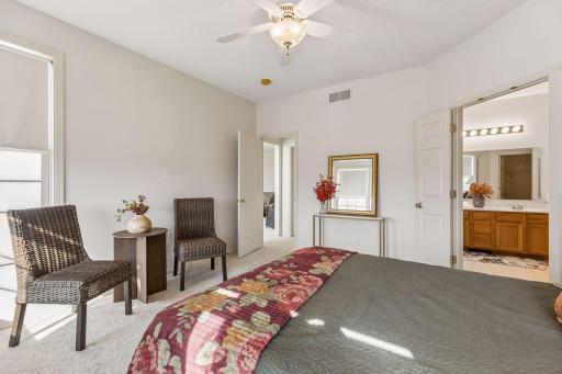 Primary bedroom with a spacious en suite bathroom.