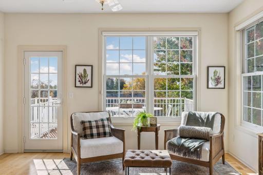 A sunny sitting area off the kitchen with direct access to the deck.