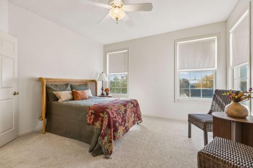 Main level primary bedroom with lots of natural light.