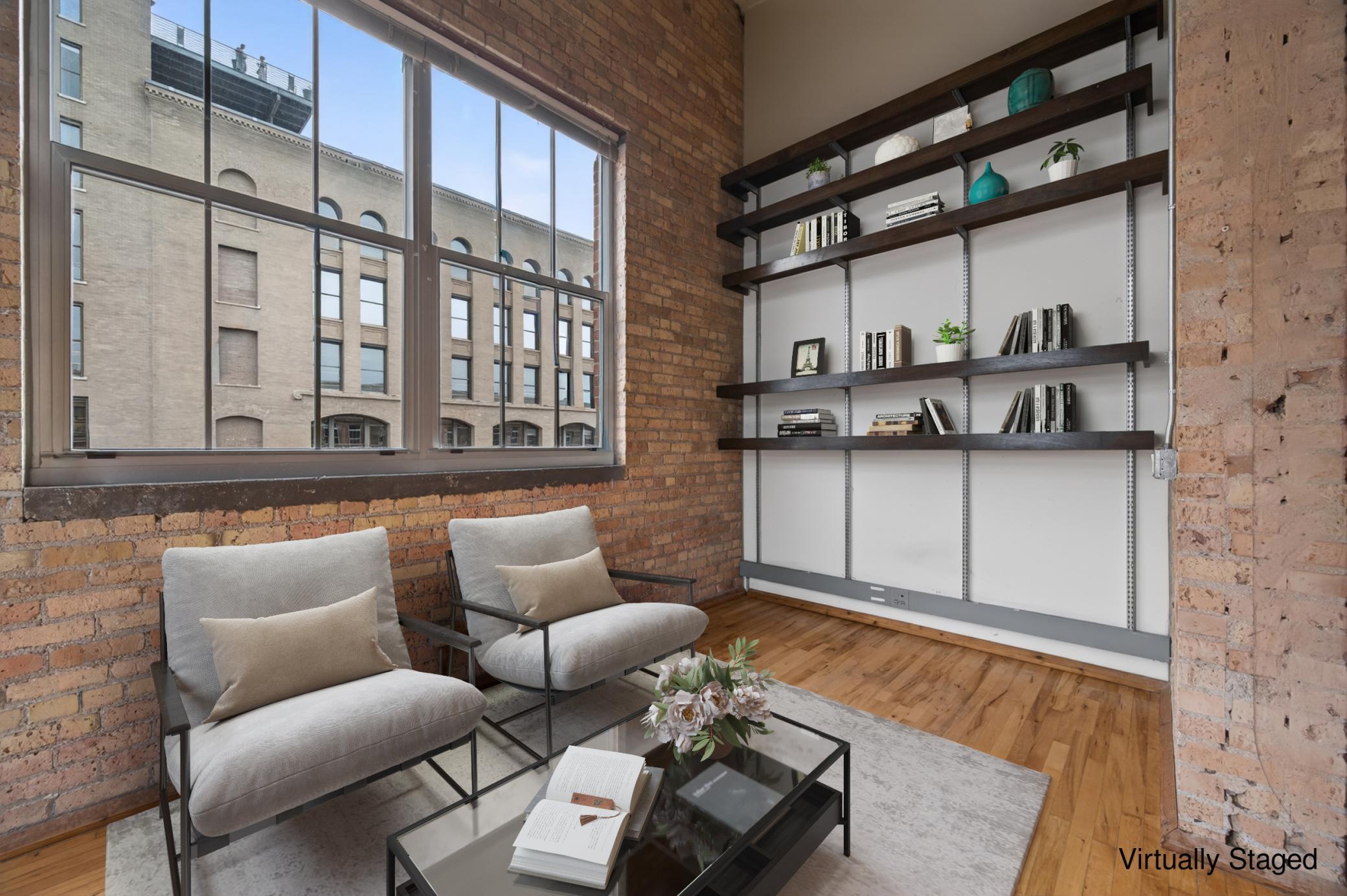 Den/sunroom with shelving (image virtually staged)