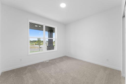 Perfect for a guest suite, office space, or recreation room, this main floor secondary bedroom is well-suited for the unique needs of any homeowner.