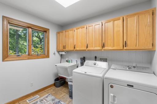 Spacious main-level laundry/mud room with closet
