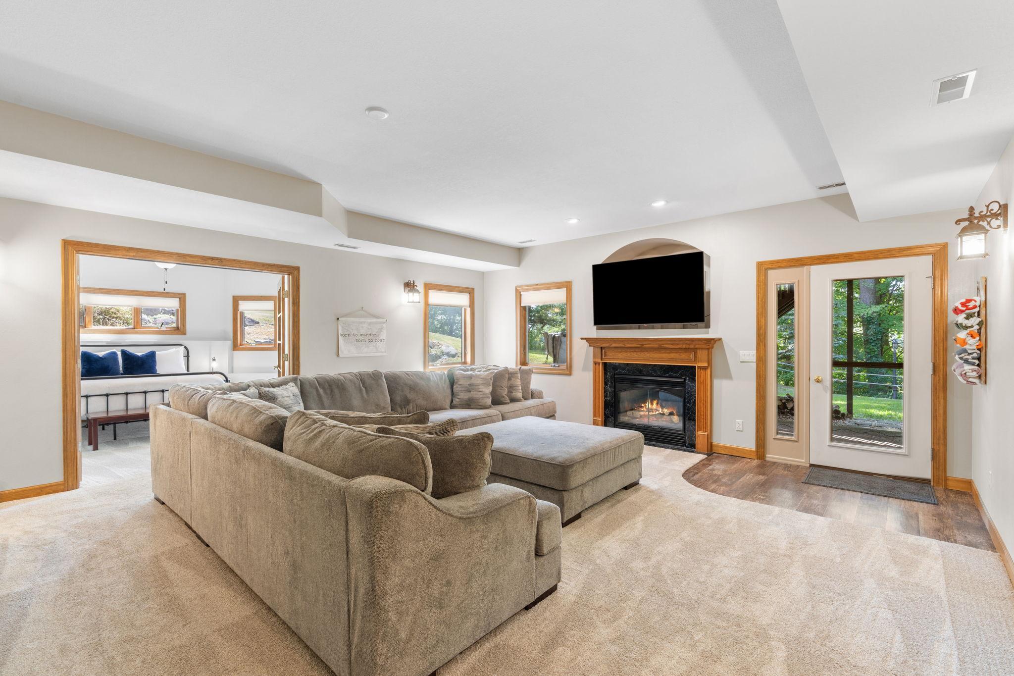 A second fireplace in lower level family room