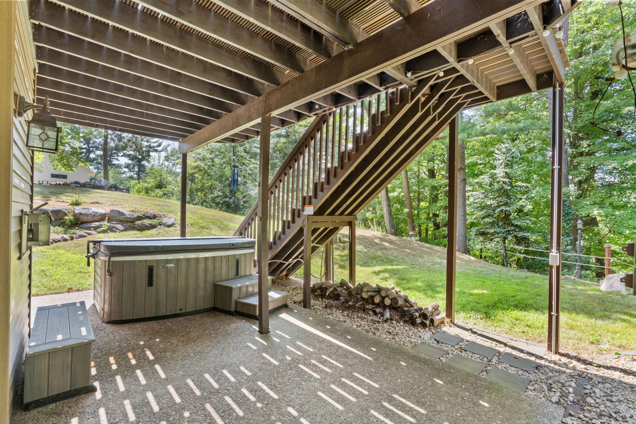 Enjoy a dip in the hot tub on the walk-out lower level patio!
