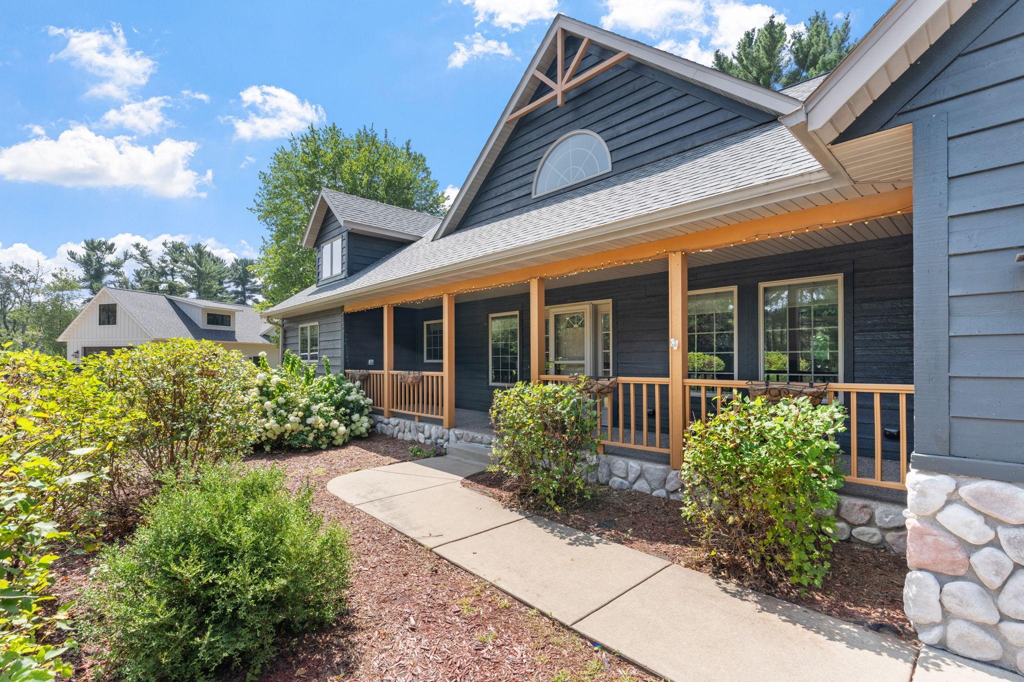 Inviting front porch and pond water feature