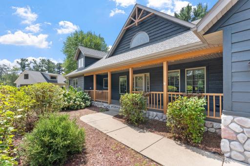 Inviting front porch and pond water feature