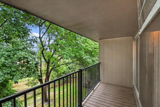 Photo for 4201 Lakeside Avenue N, 307, Brooklyn Center, MN 55429 - listing #7130910 Private third-floor deck overlooking surrounding yard.