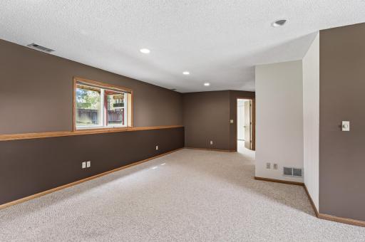 Large storage space under the stairs and front entry.
